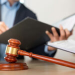 Gavel and legal documents on a lawyer’s desk related to Virginia protective orders